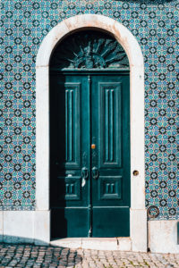 detail of portuguese architecture in Lisbon: Old tradition colorful door of the house in Lissabon, Lisboa Portugal. detail of portuguese architecture in Lisbon: Old tradition colorful door of the house in Lissabon, Lisboa Portugal.